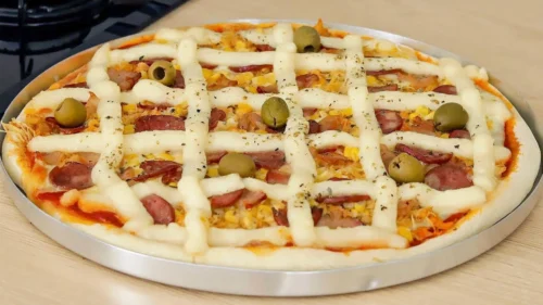 Massa de Pizza Caseira com Orégano e Azeite: Uma Base Crocante para Sabor Único